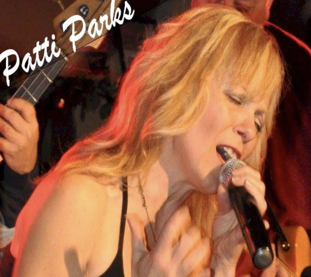 Rock out with Patti Parks during Turn On Tuesdays at the Carousel Bar, pictured singing here.